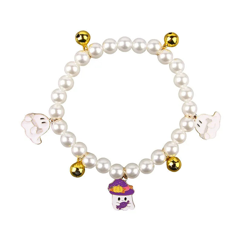 Three pet necklaces with pearl decoration and bells for cats and dogs
