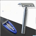 Double edged safety razor and blade in a storage box, a traditional wet shaving kit.