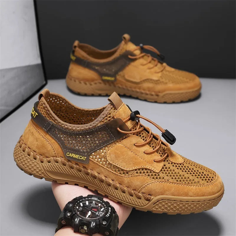 Men's brown suede casual shoes with elastic band closure and hand-stitched sole.
