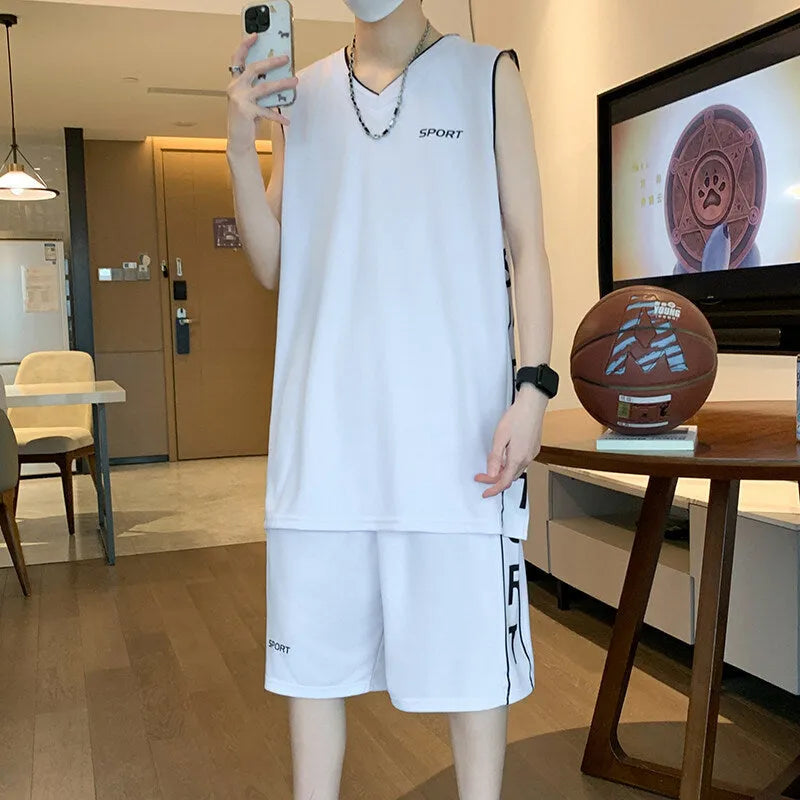 Polyester basketball sports suit with short sleeve vest and matching shorts in various colours