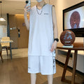 Polyester basketball sports suit with short sleeve vest and matching shorts in various colours