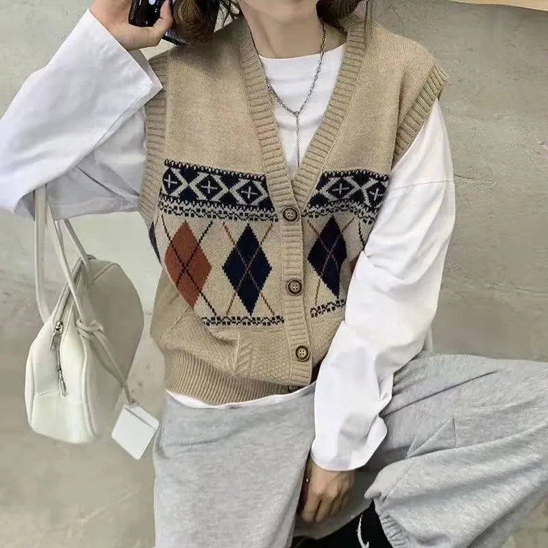 Loose sleeveless cardigan top in diamond plaid pattern, shown in khaki colour.