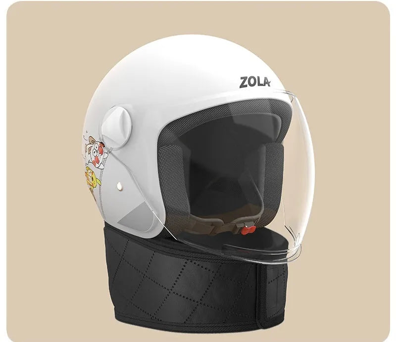 Blown Away winter cycling helmet with attached fleece scarf and clear anti-fog visor on a handlebar.