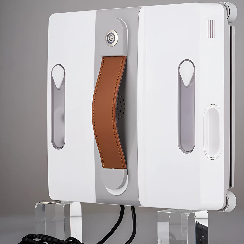 White intelligent window cleaning robot for high-rise buildings on a window pane.