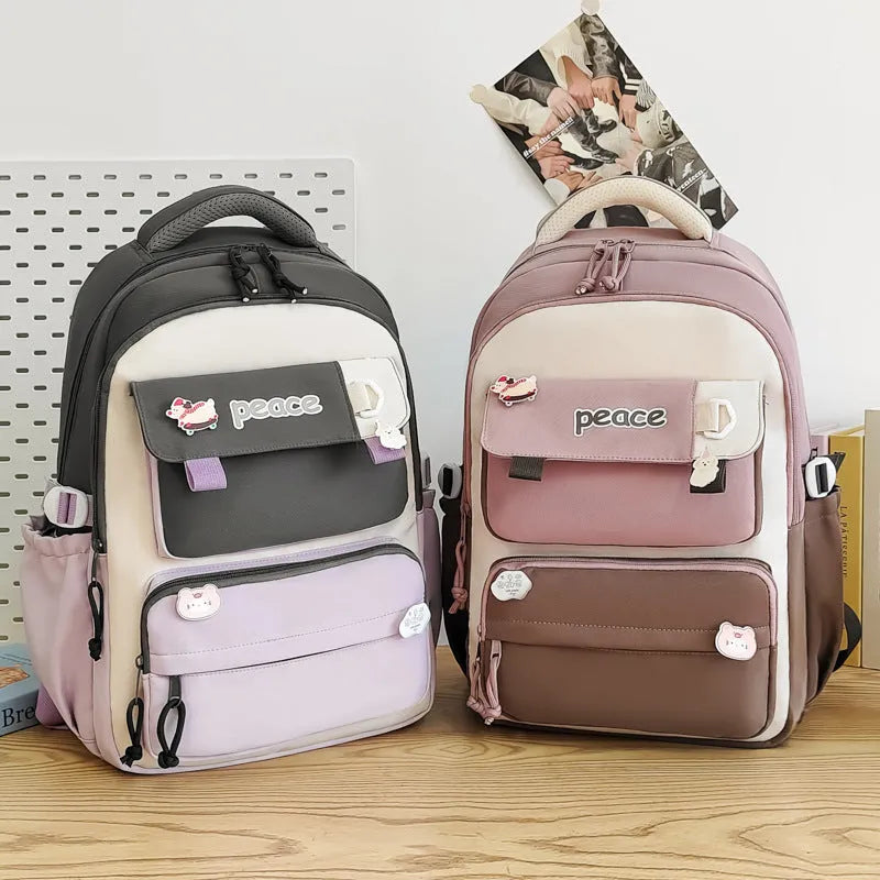 Women's large capacity nylon schoolbag 29x45x17cm with letter pattern, available in grey, khaki, purple, black, and blue
