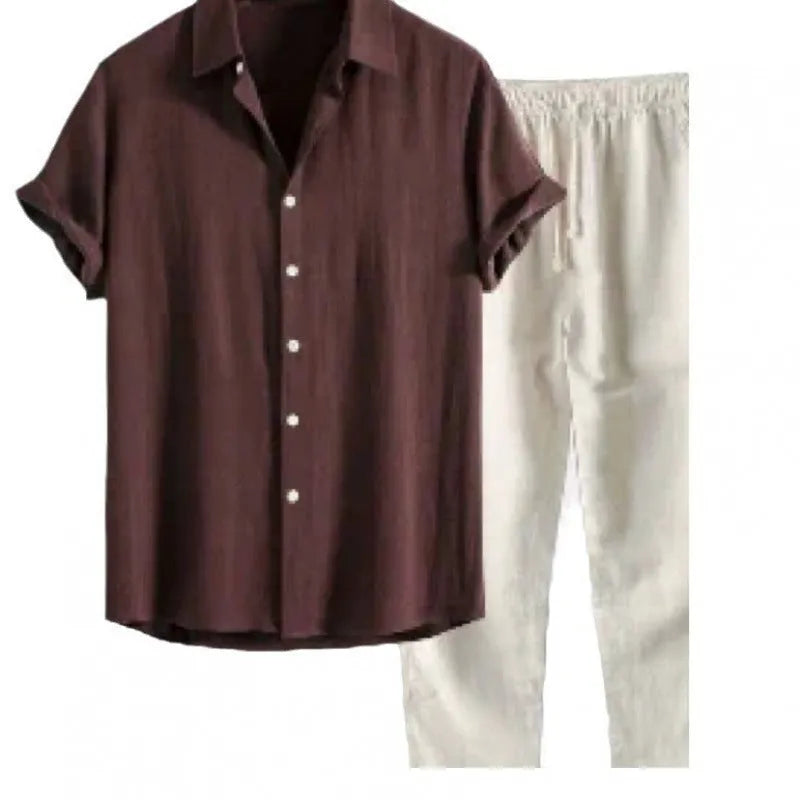 Man wearing a loose fit linen-look short sleeve shirt and matching casual trousers in a neutral colour.