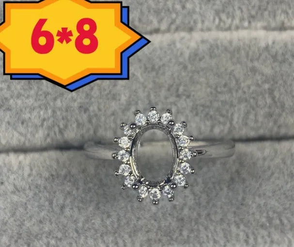Oval denier open mouth ring with 6x8mm stone and five-pointed star on electroplated copper band.