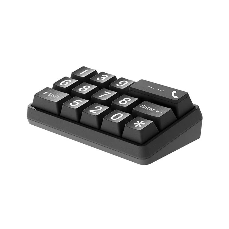 Creative typewriter-style temporary parking number plate in zinc alloy and ABS on a desk