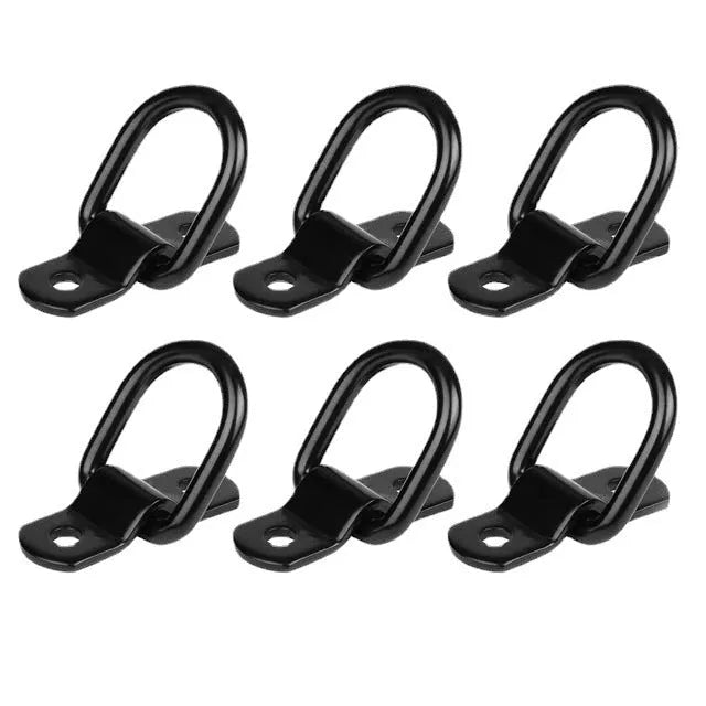 Black galvanised pull ring floor hook for mounting in a truck cargo bed.