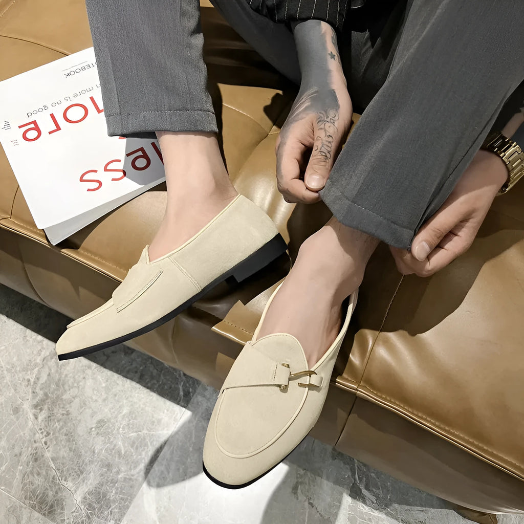Pair of men's cow split suede leather loafers with low heel and metal detail in beige