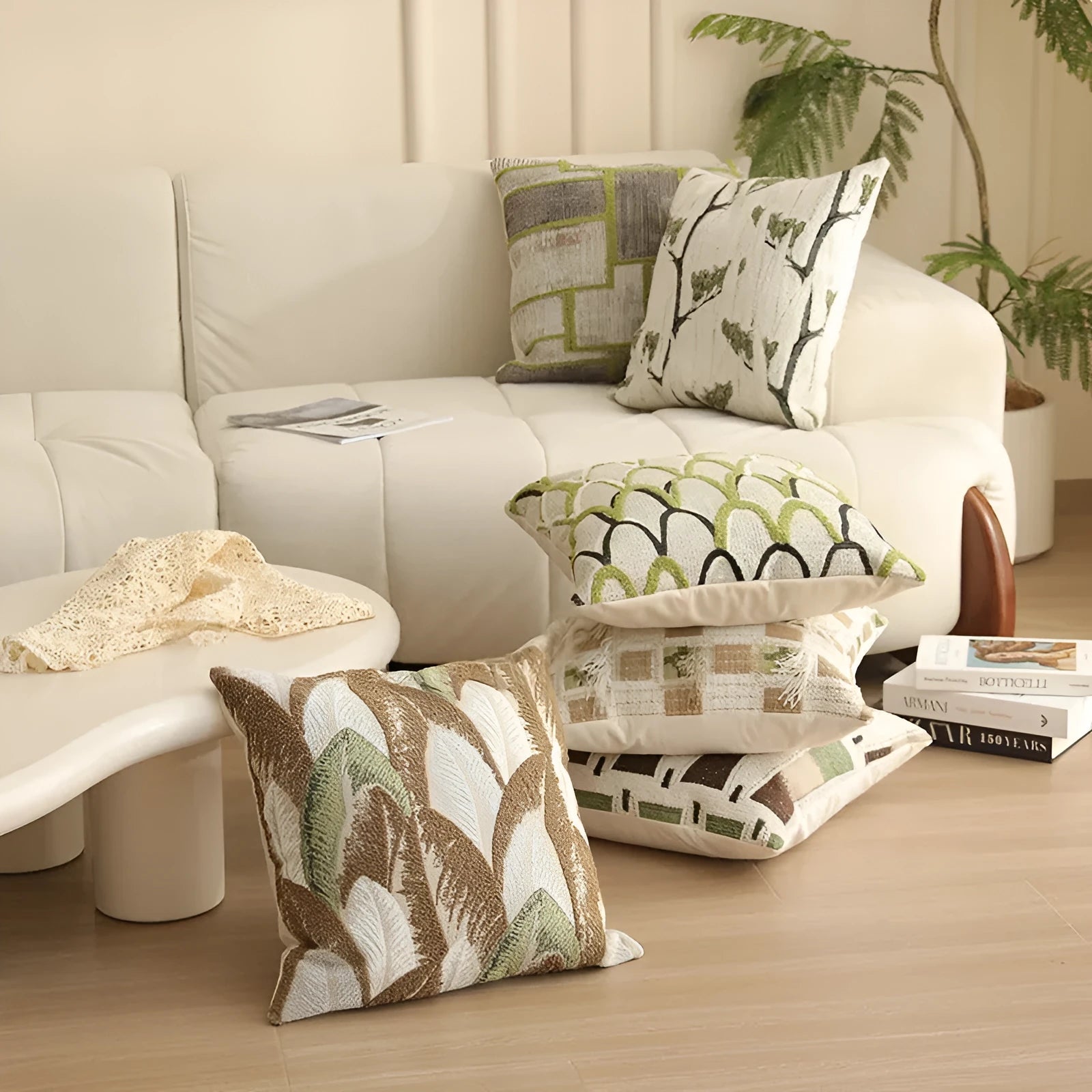 Square 45cm jacquard cushion cover with retro floral pattern in Nordic style on a grey sofa.