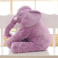 Soft grey elephant plush toy pillowcase for a child's bed.