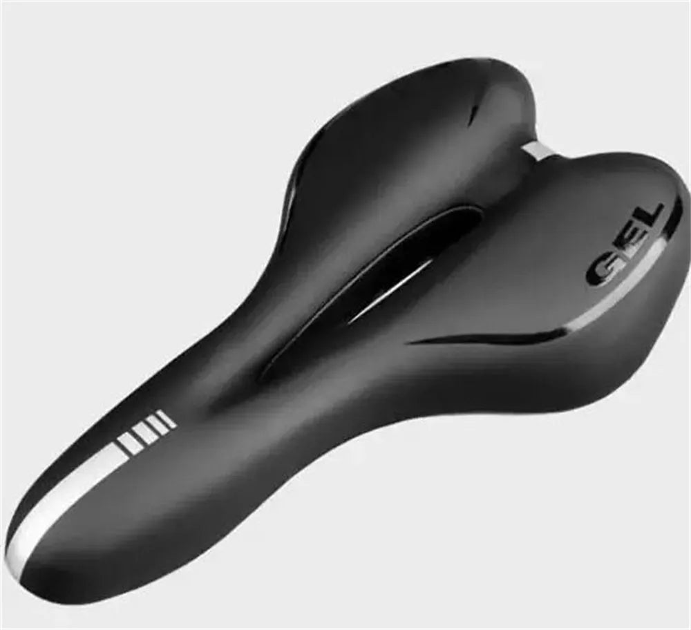 Black bicycle saddle with silicone padding and two visible steel springs underneath, shown with a waterproof cover and tools.