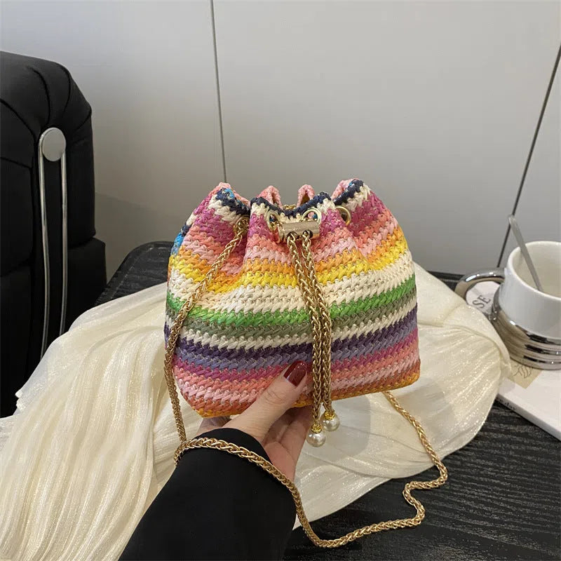 Women's straw woven bucket bag with diamond chain, colour-block plaid pattern, single shoulder strap, and multicolor finish