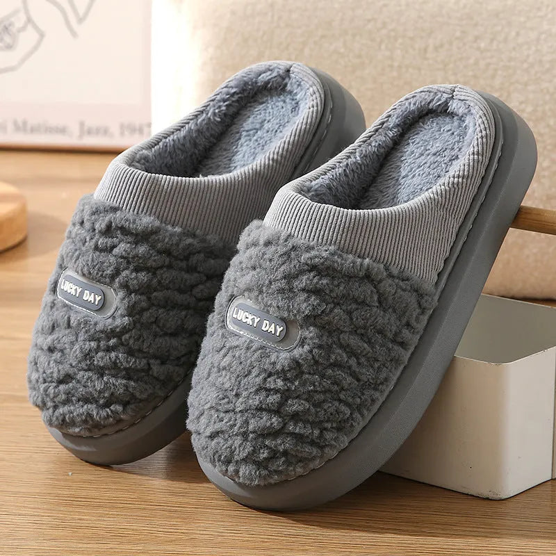 Men's plaid rabbit hair slippers with thick EVA sole and wool lining in brown colour.