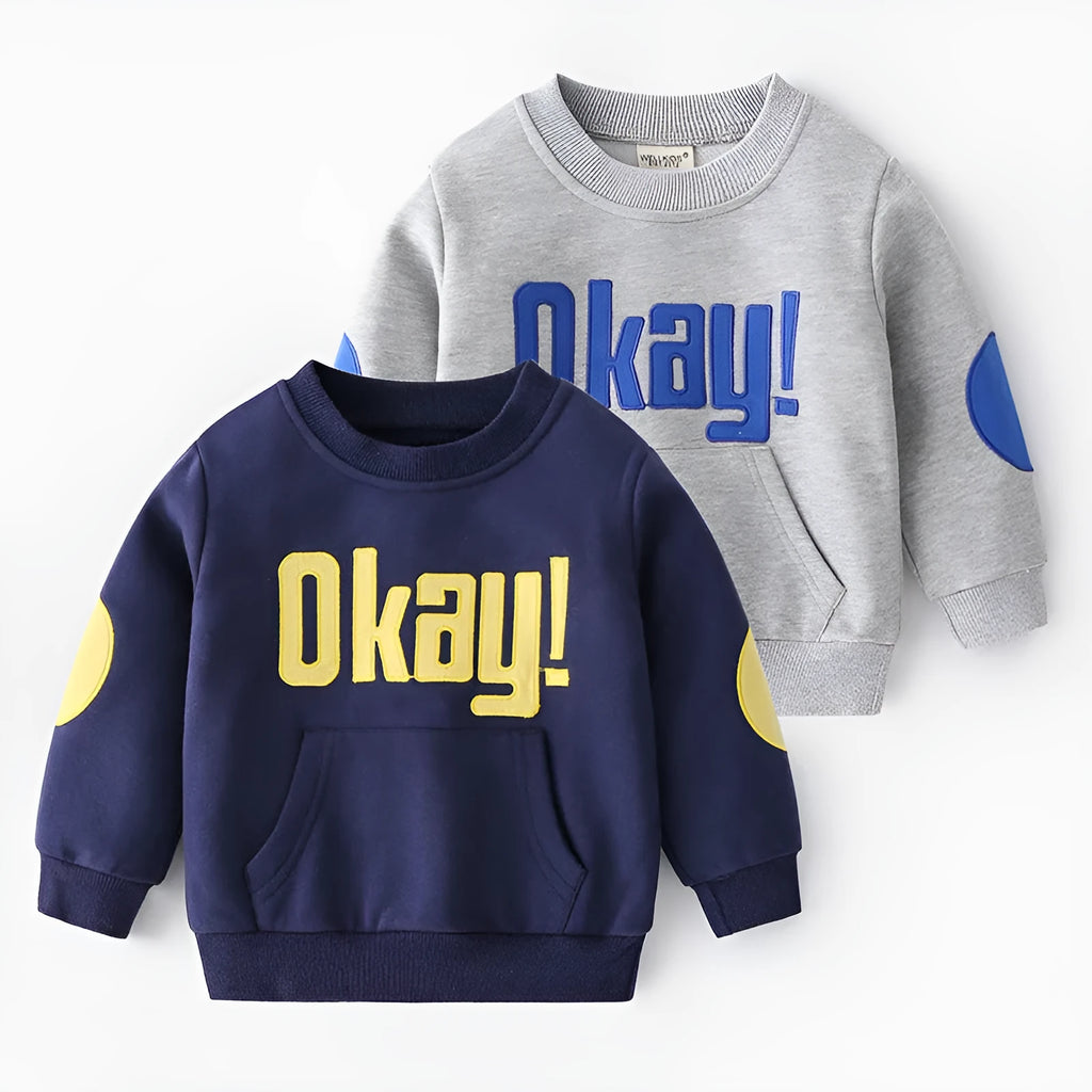 Casual boys cotton pullover sweatshirt with English print in navy blue on child model