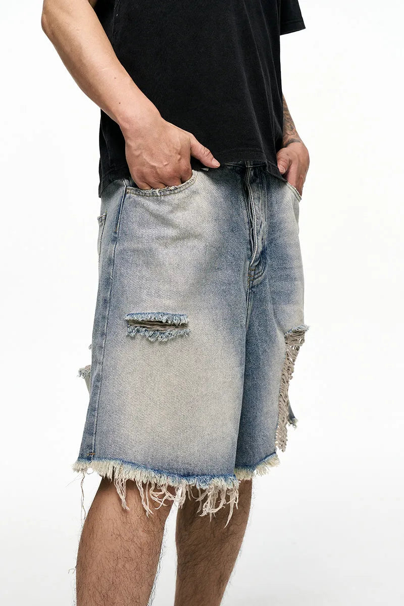 Men's light blue baggy denim shorts with retro washed finish and wide leg design