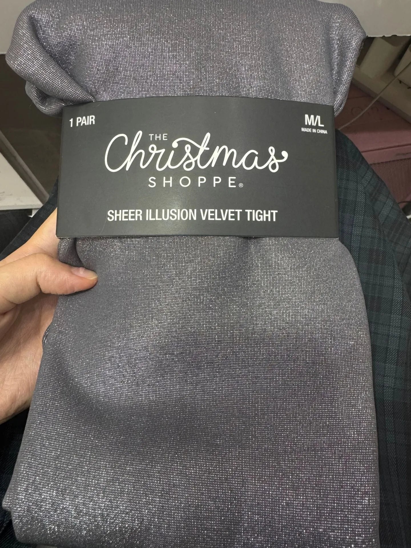 Women's anti-snagging thermal leggings in black and coffee colours showing wool lining and footed style.