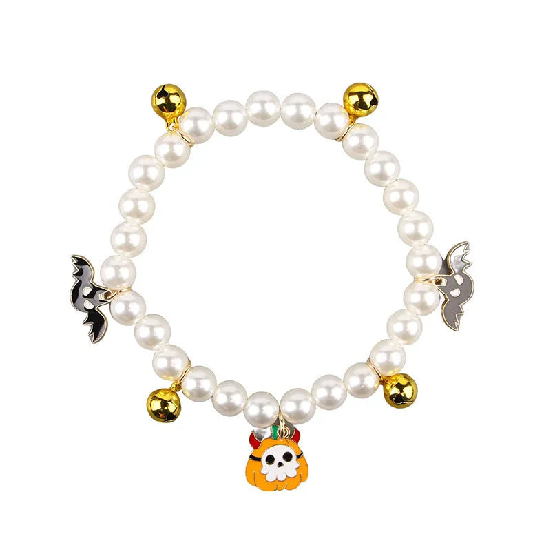 Three pet necklaces with pearl decoration and bells for cats and dogs