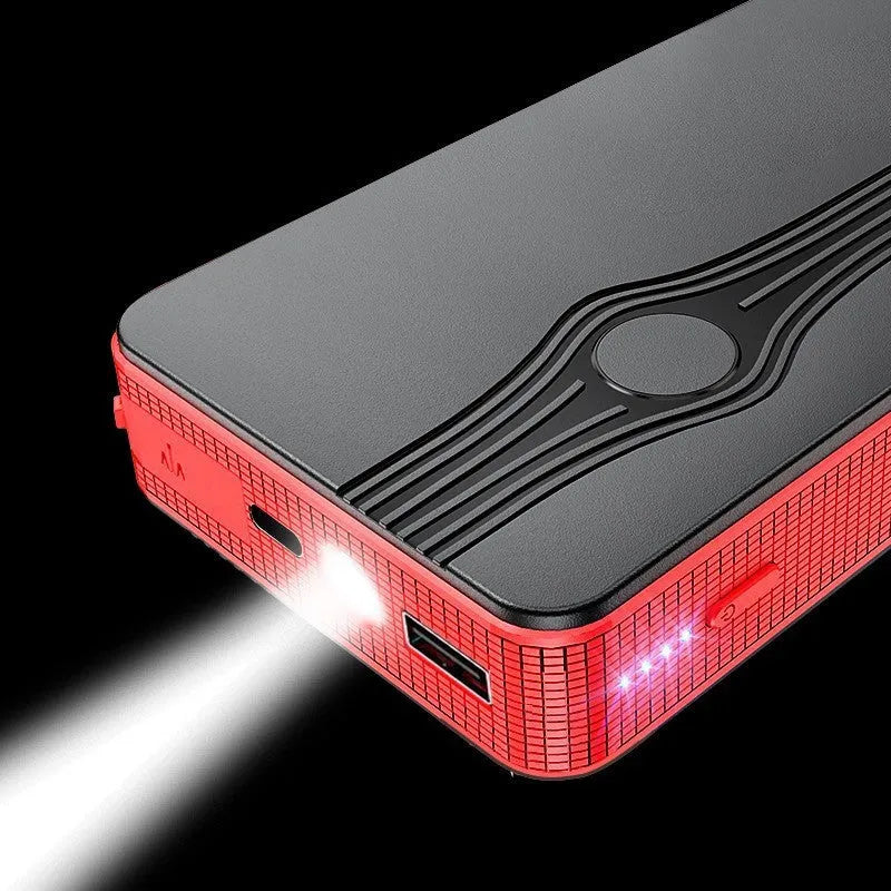 Red K4-E automobile emergency starting power supply unit with data cable, compact rectangular design.