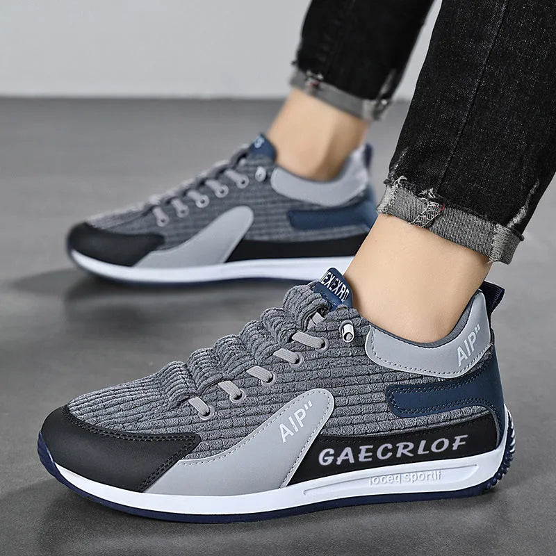 Men's grey and green mesh running shoes with viscose sole and lace-up closure