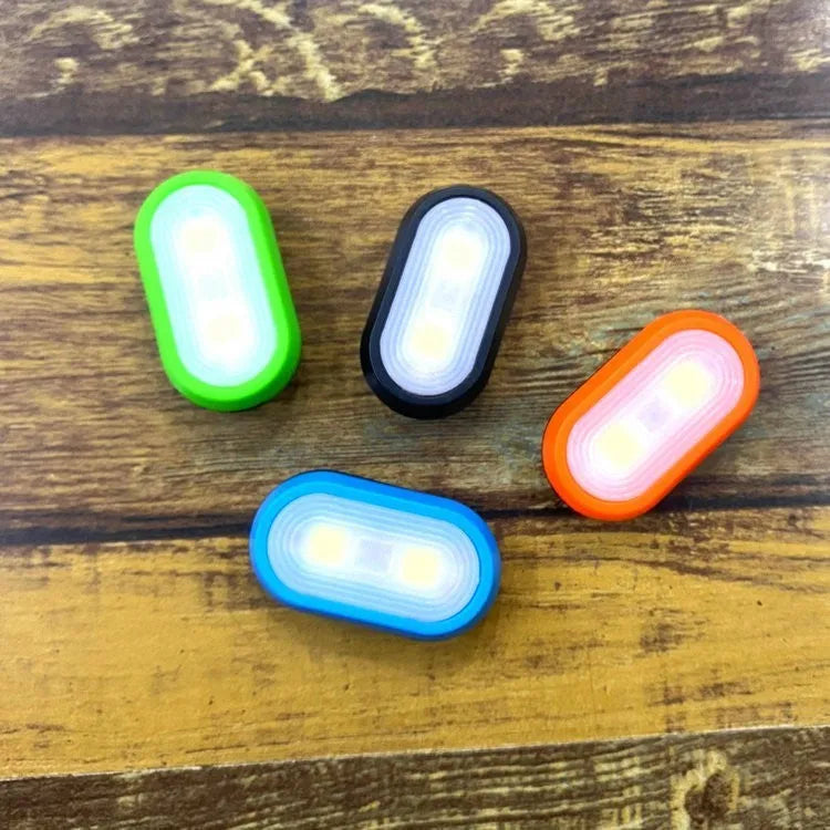 Compact keychain light with 3W LED in black, blue, green, and orange ABS casing