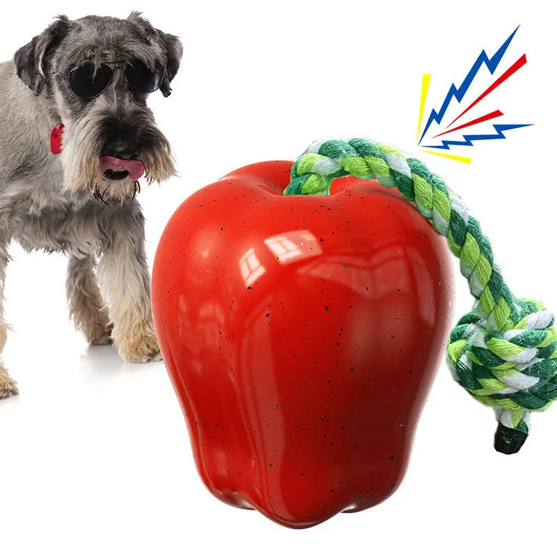 Green and red plastic dog molar toy with food dropping ball design for outdoor play