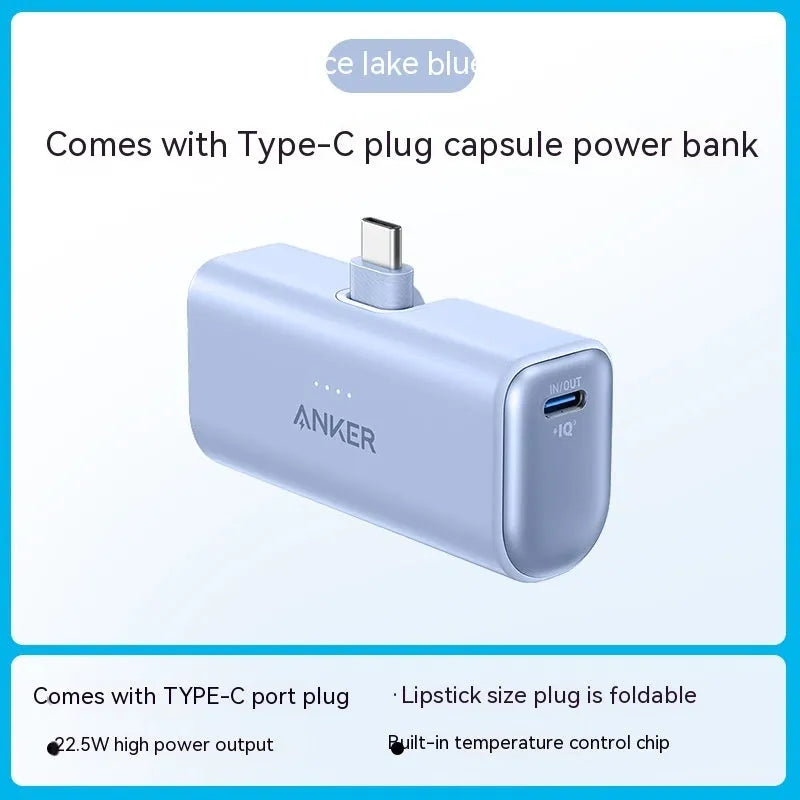 Small capsule-shaped power bank in multiple colours showing USB-C port and compact size.