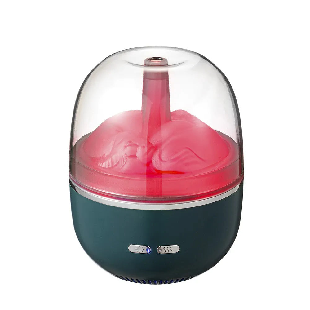Green ultrasonic aromatherapy humidifier with heavy fog and colourful gradient light on a desk