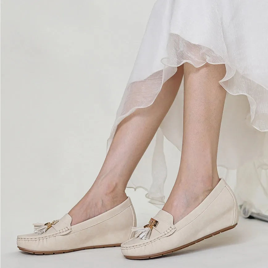 Women's flat heel height increasing insole shoe covers in beige, black, blue, and brown colours with a round toe.
