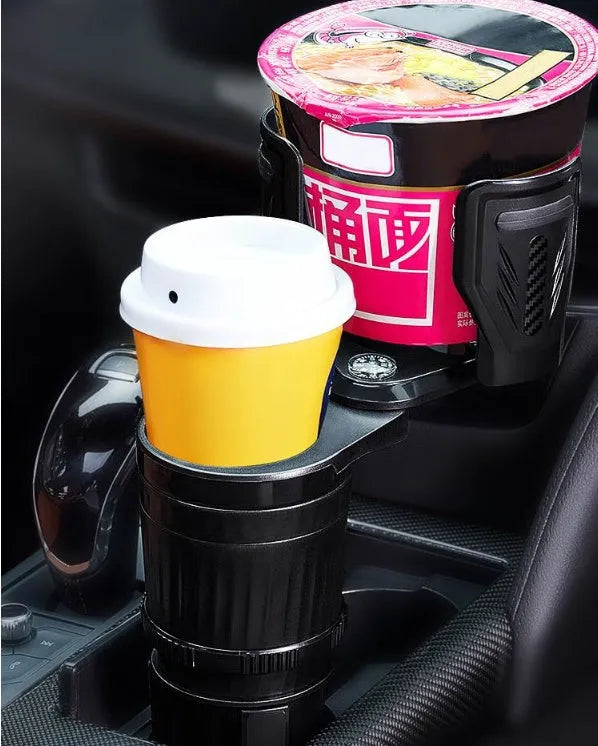Black ABS car water cup holder with a retractable adjustable base on a car centre console.
