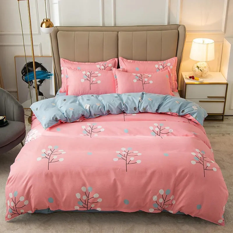 Cotton duvet cover and fitted sheet bedding set in a colour option, shown on a bed