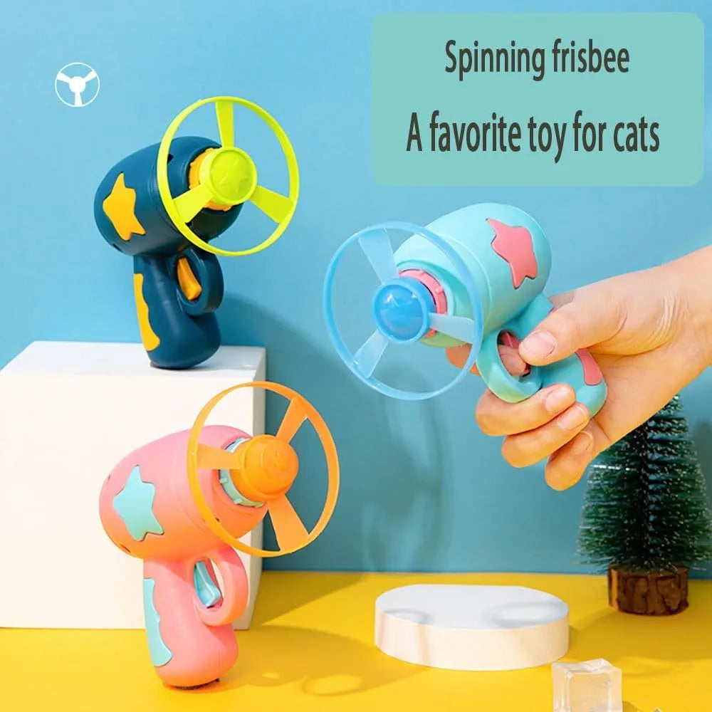 Blue plastic cat toy gun with spinning frisbee launcher for indoor play