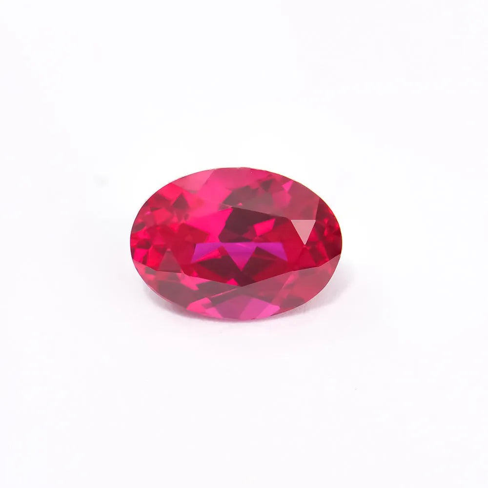 Artificial ruby gemstone in multiple cuts including round, princess square, and water drop shapes