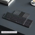 Black folding Bluetooth keyboard for mobile phones and tablets shown in open and closed positions
