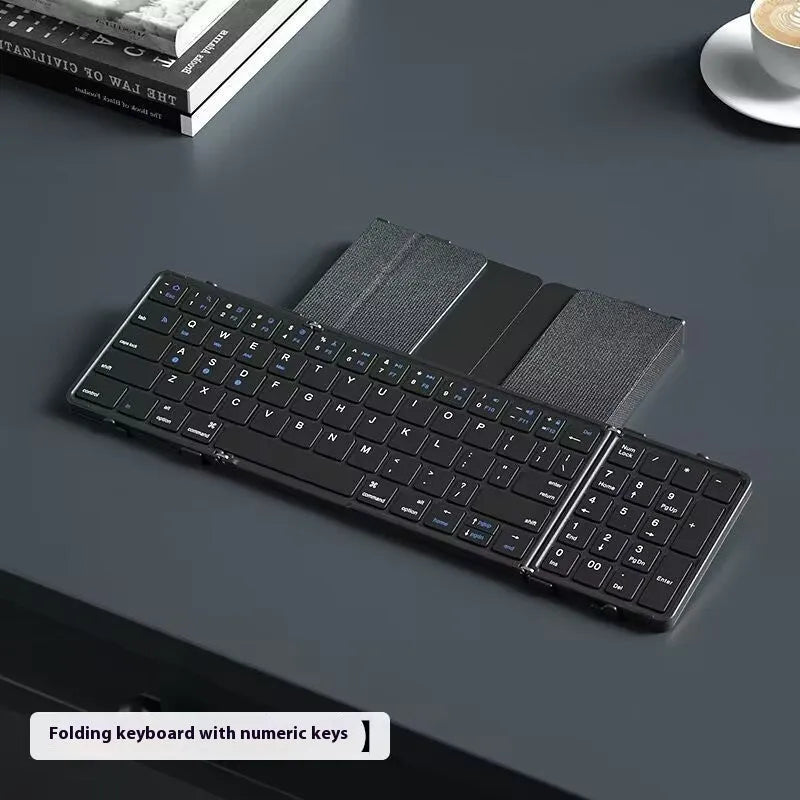 Black folding Bluetooth keyboard for mobile phones and tablets shown in open and closed positions