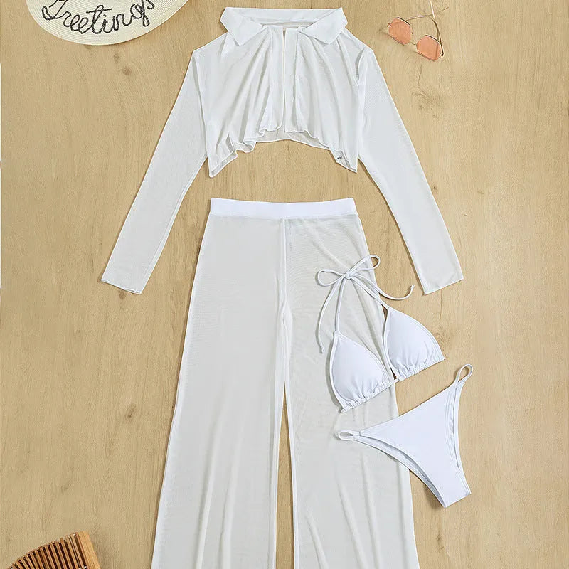 White women's four-piece swimsuit set showing backless top, high-waisted trousers, bra, and panties arranged together