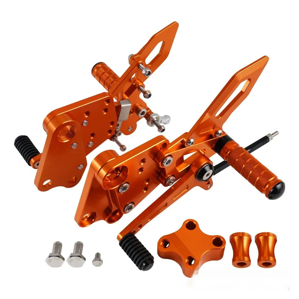 KTM DUKE motorcycle raised rear shift pedal support bracket assembly in black and orange
