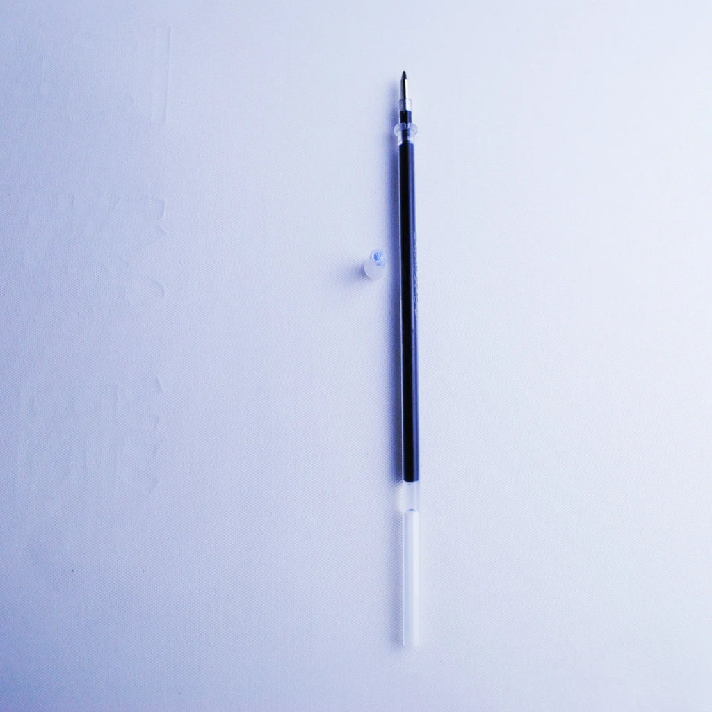 Portable plastic pen holder and eight 0.5mm blue ink refills on a white background.