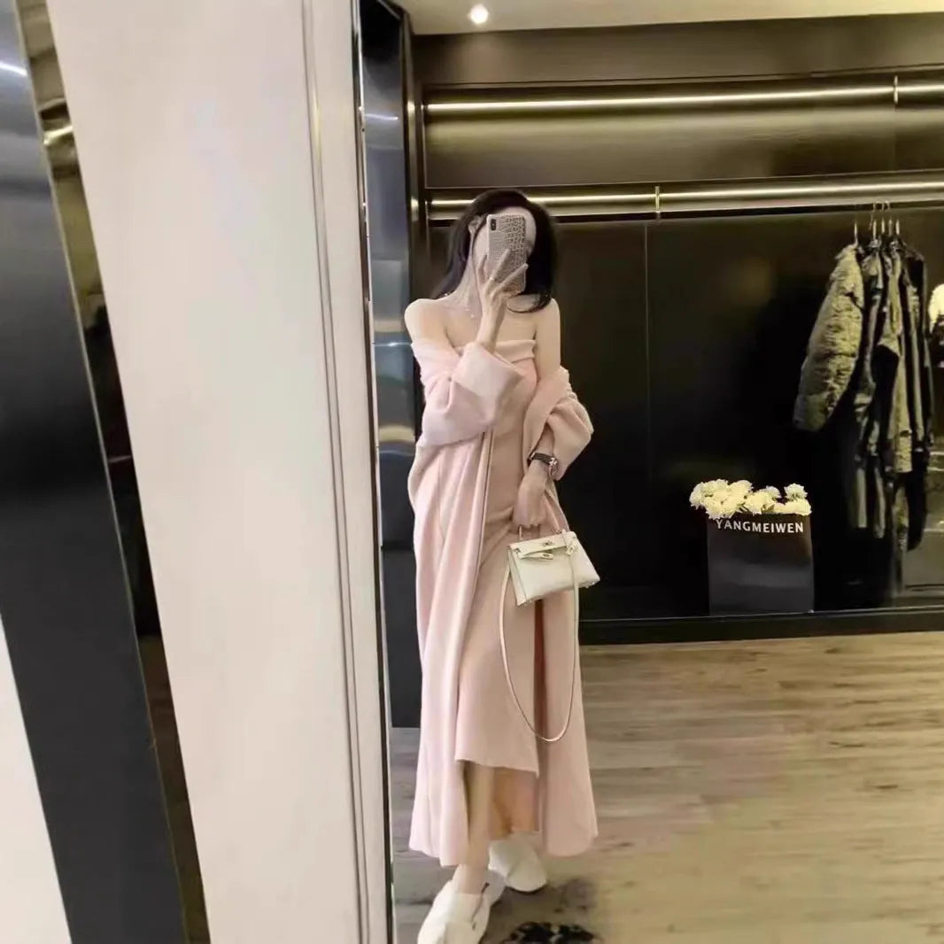 Women's grey flocked knitted long cardigan worn over matching dress in a casual two-piece set.