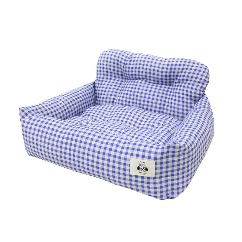 Grey and blue plaid cloth dog beds shown in two sizes for car travel.