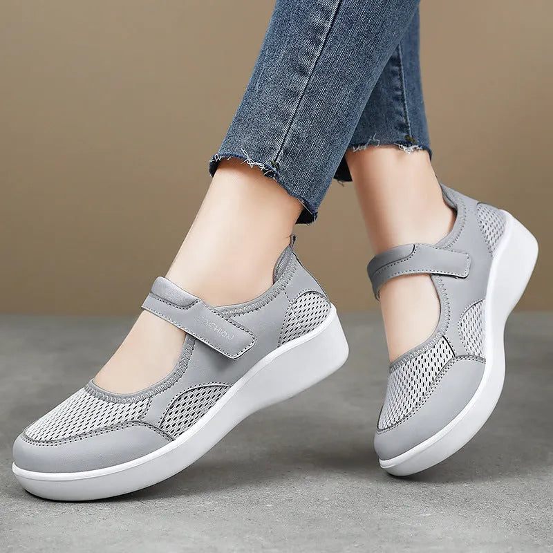 Women's grey mesh slip-on casual shoes with Velcro fastening and flat polyurethane sole