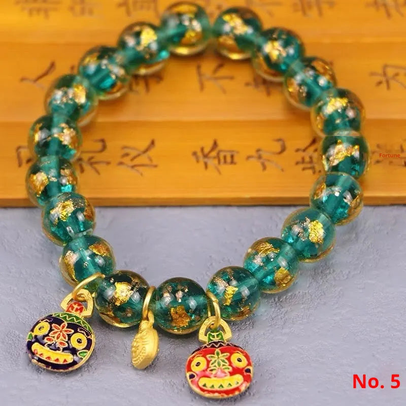 Ancient French Glaze Year glass bracelet with geometric shapes and auspicious court patterns in one of six colours.