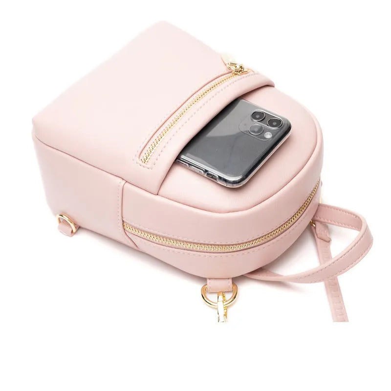 Soft PU mini backpack in street style, shown open to reveal internal phone pocket and zipper bag.