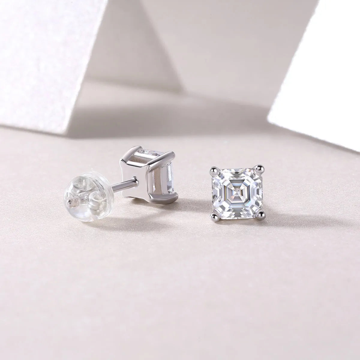 Pair of square cut moissanite stud earrings in S925 silver with platinum plating, gold colour finish, in gift box with GRA certificate
