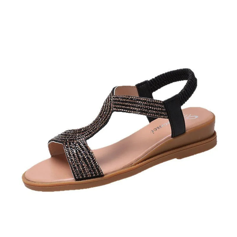 Women's patent leather summer sandals with rhinestone details and round toe design in black colour