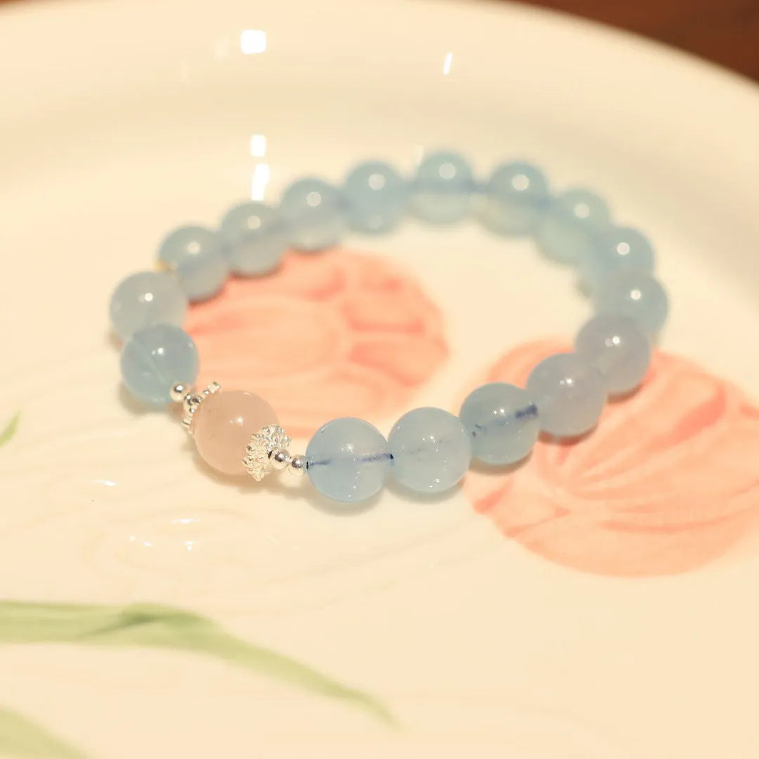 Aquamarine DIY bracelet for women with Fengjiu fox charm, showing pearl and crystal design options.