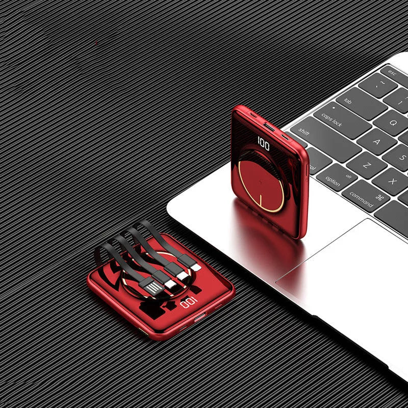Black 20000mAh fast charging power bank with LCD display showing battery percentage.