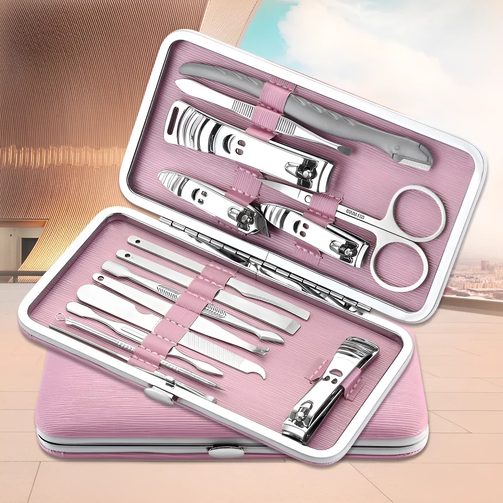 Pink 15-piece stainless steel manicure tool set in compact case with nail clippers and files
