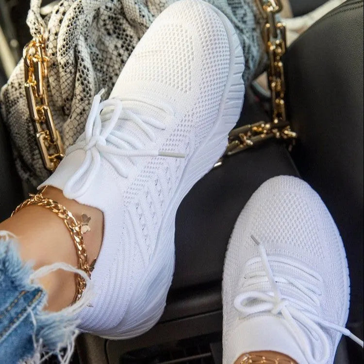 Women's sneakers with thick rubber soles in eight colour options including white, red, blue, black, khaki, grey, pink, and light blue